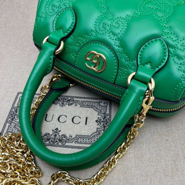 G*u*i gg matelassé leather top handle bag