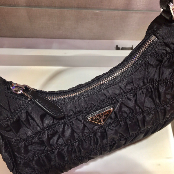 Pra*a nylon and saffiano leather mini bag