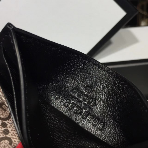 G*u*i card holder