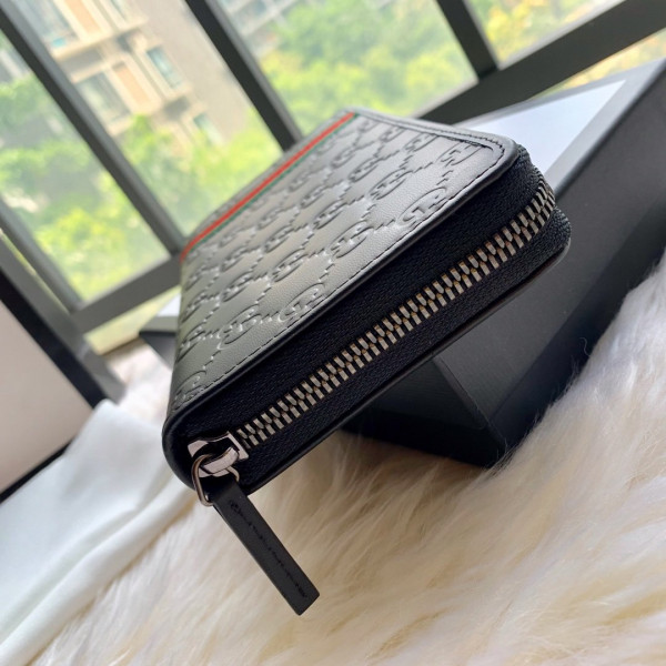 G*u*i leather zip around wallet