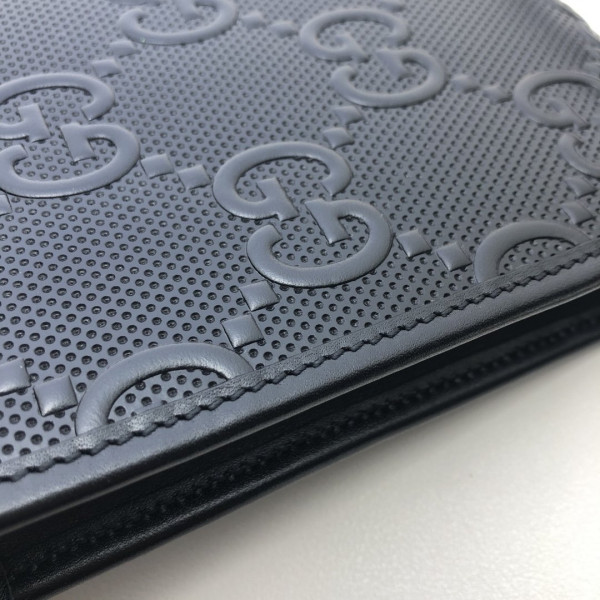 G*u*i gg embossed mini bag