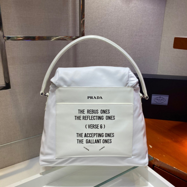 Pra*a signaux nylon and leather hobo bag