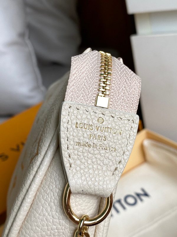 l**is V*t*n mini pochette accessoires