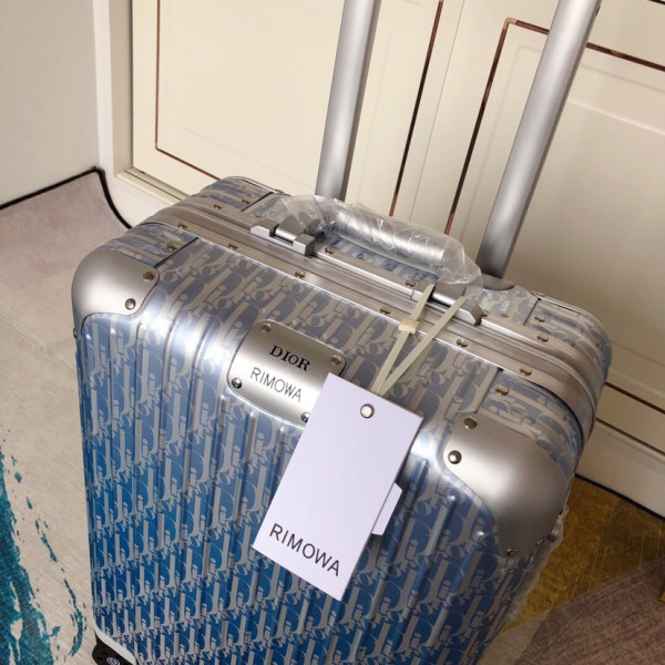 D*or x rimowa suitcase