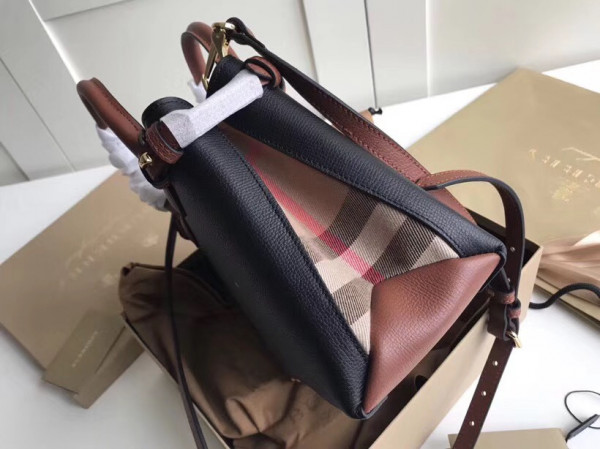 B**rry the small banner in leather and house check