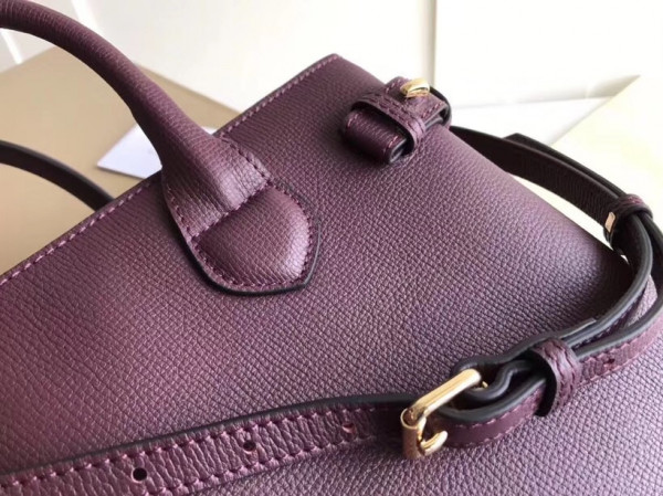 B**rry the medium banner in leather and house check