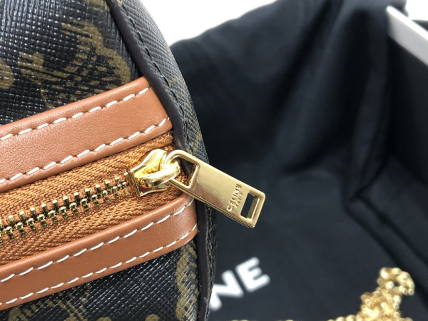 Ce**e clutch on chain in triomphe canvas