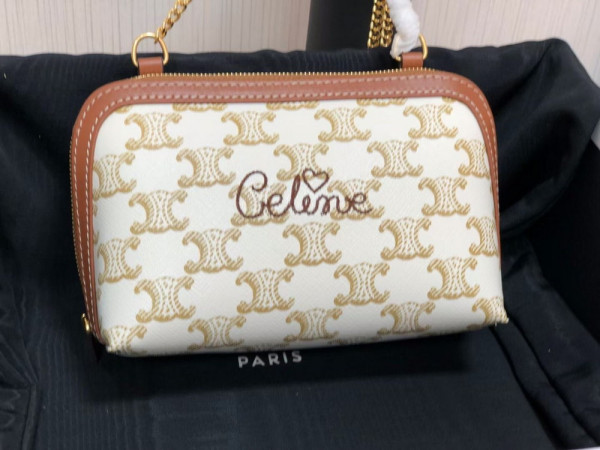 Ce**e clutch on chain in triomphe canvas