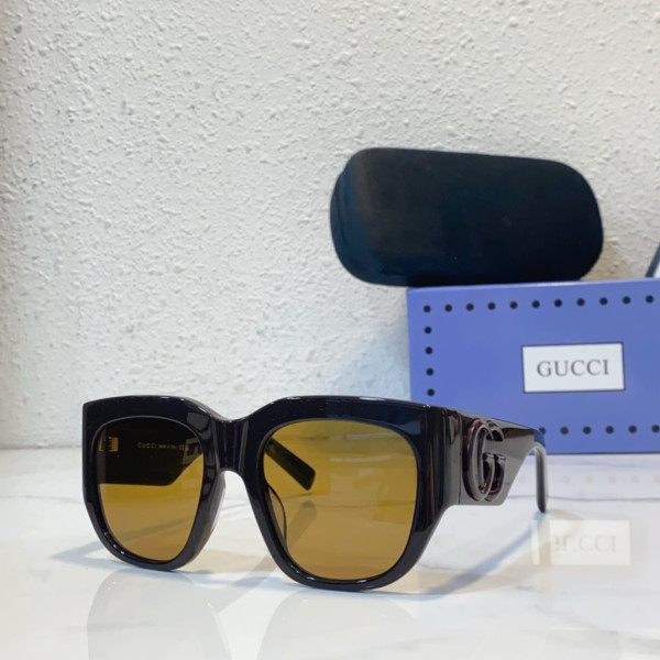 G*u*i sunglasses